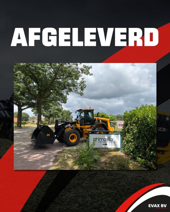 Gele loader afgeleverd bij Primasta op zonnige dag.